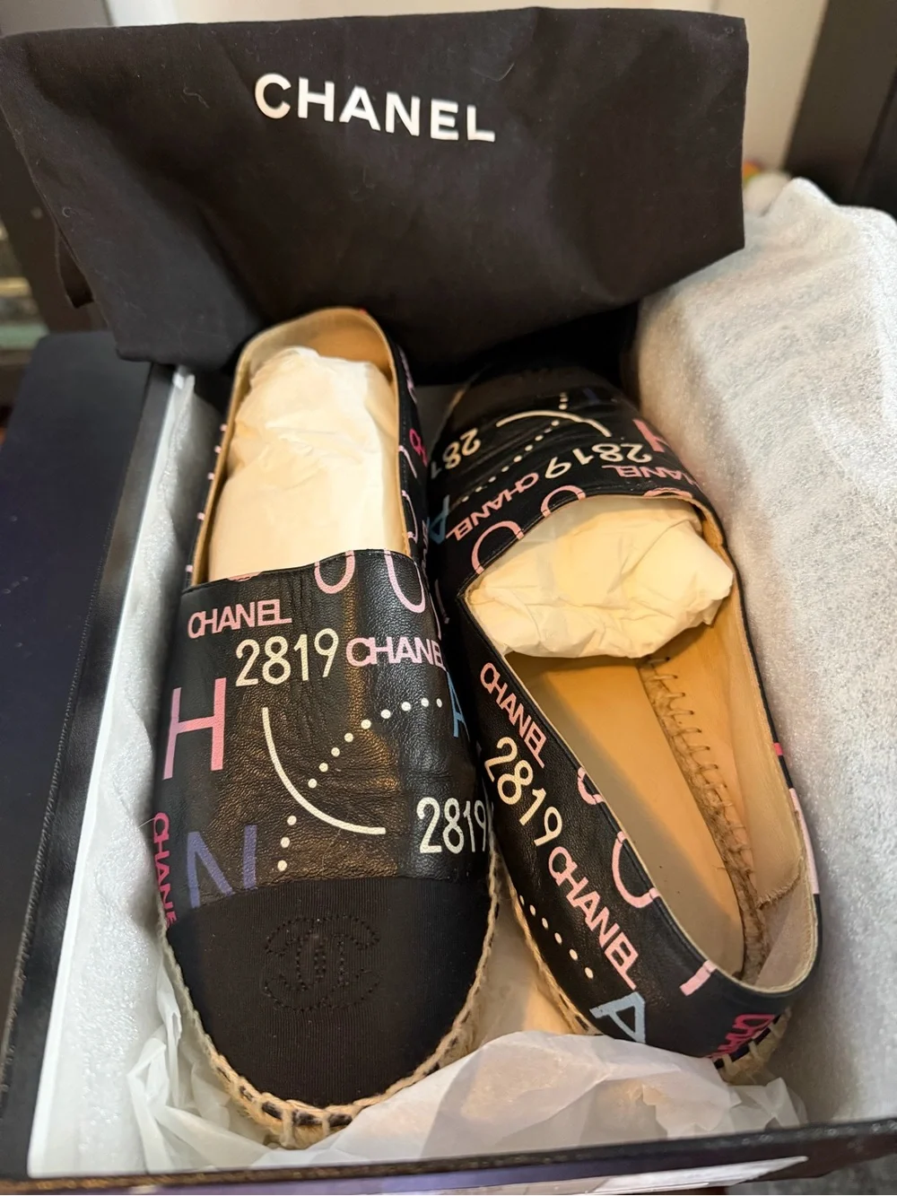 Authentic CHANEL Black Canvas Espadrilles with Pink & Blue Logo Print